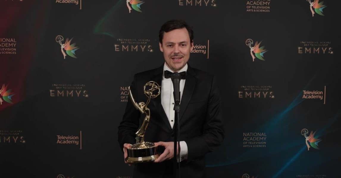 Jo Plaete holding the Emmy at the 2026 awards ceremony